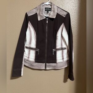 Women's Jacket in different shades of Browns and White.